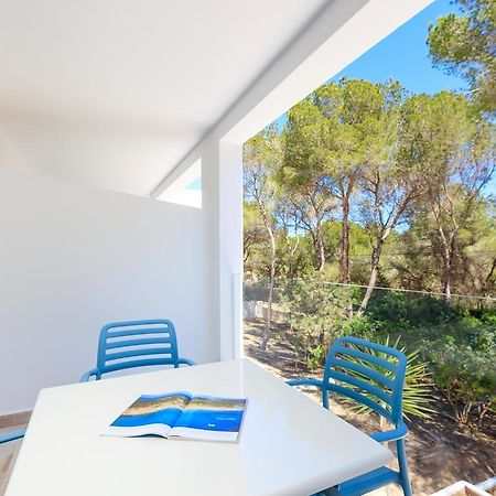 Pinos Playa Suites Es Migjorn Exterior foto