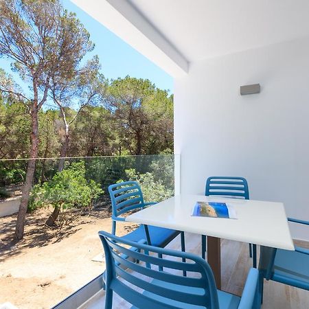 Pinos Playa Suites Es Migjorn Exterior foto