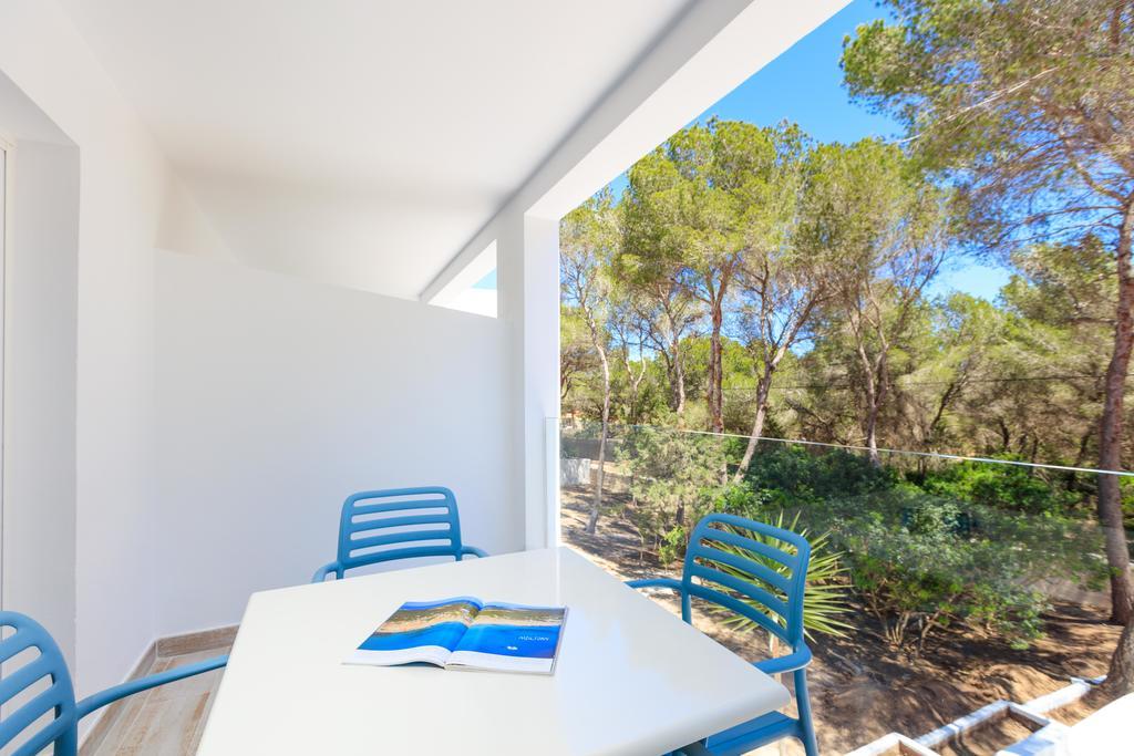 Pinos Playa Suites Es Migjorn Exterior foto